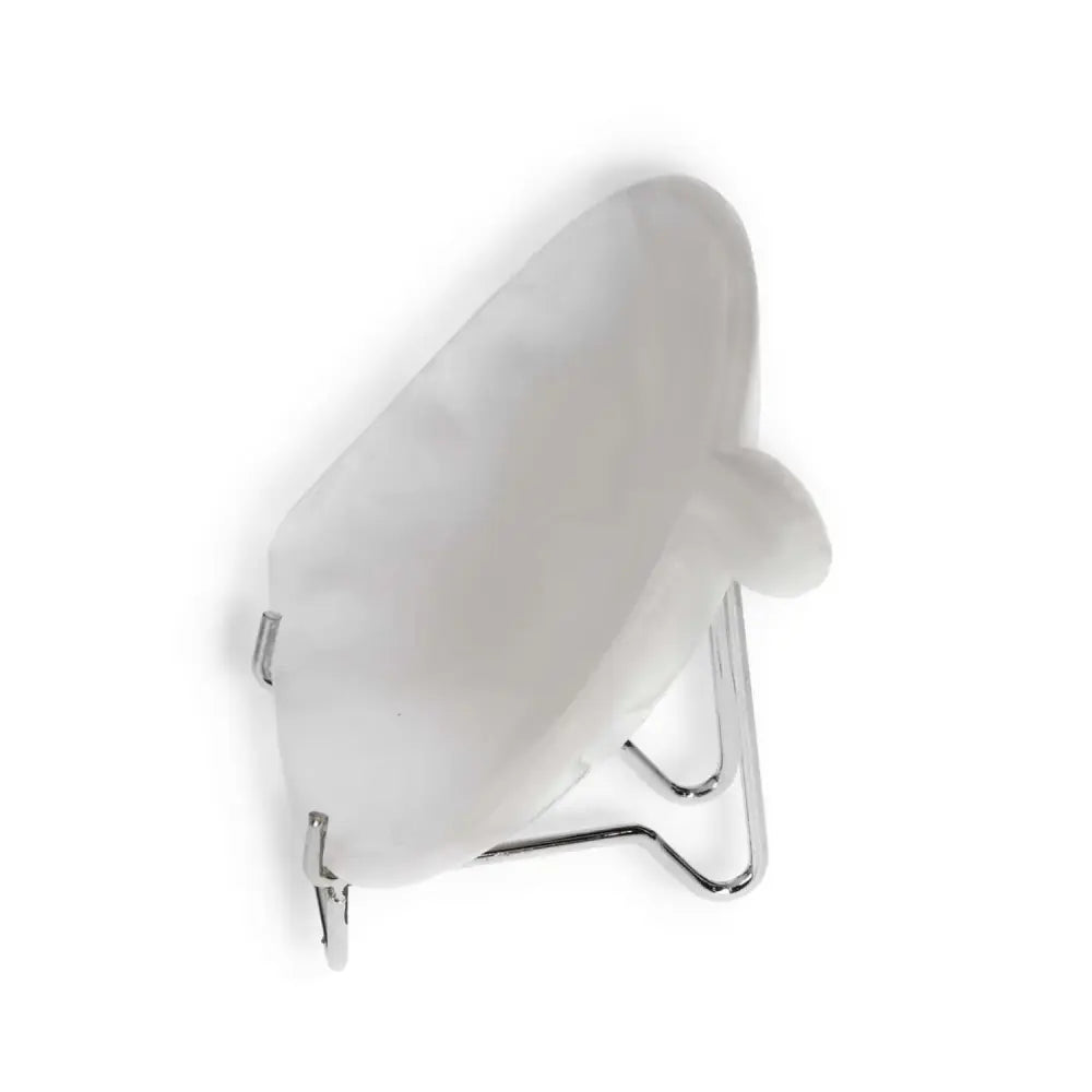 White ceramic shell-shaped small platter on a stand, showcasing elegant craftsmanship and a textured surface for decorative use.