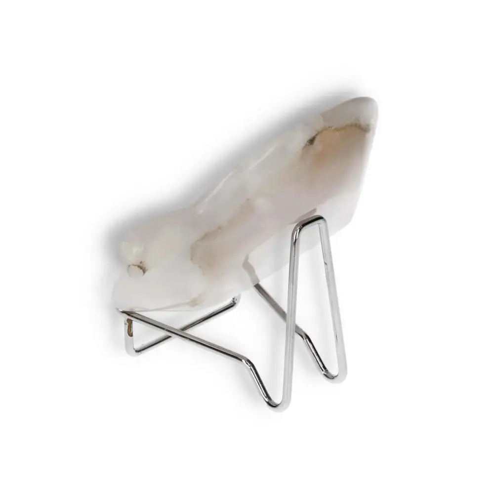 Elegant rose onyx platter on display stand, showcasing unique color variations and polished surface, ideal for serving or decor.