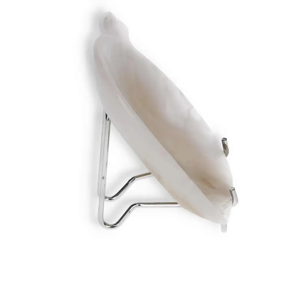 Elegant rose onyx platter on a metal stand, showcasing unique color variations and polished finish for refined table display.
