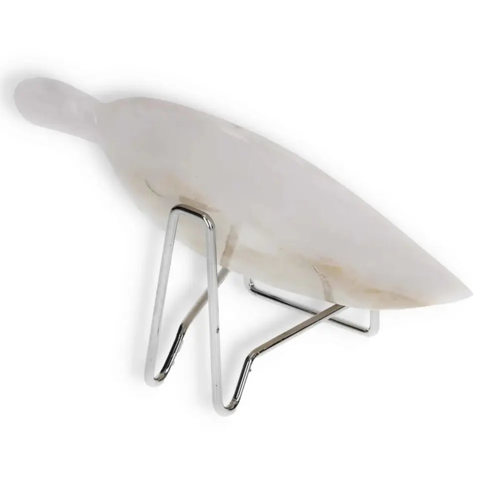 Rose Onyx Platter on silver stand showcasing its elegant rose-hued surface and natural veining.