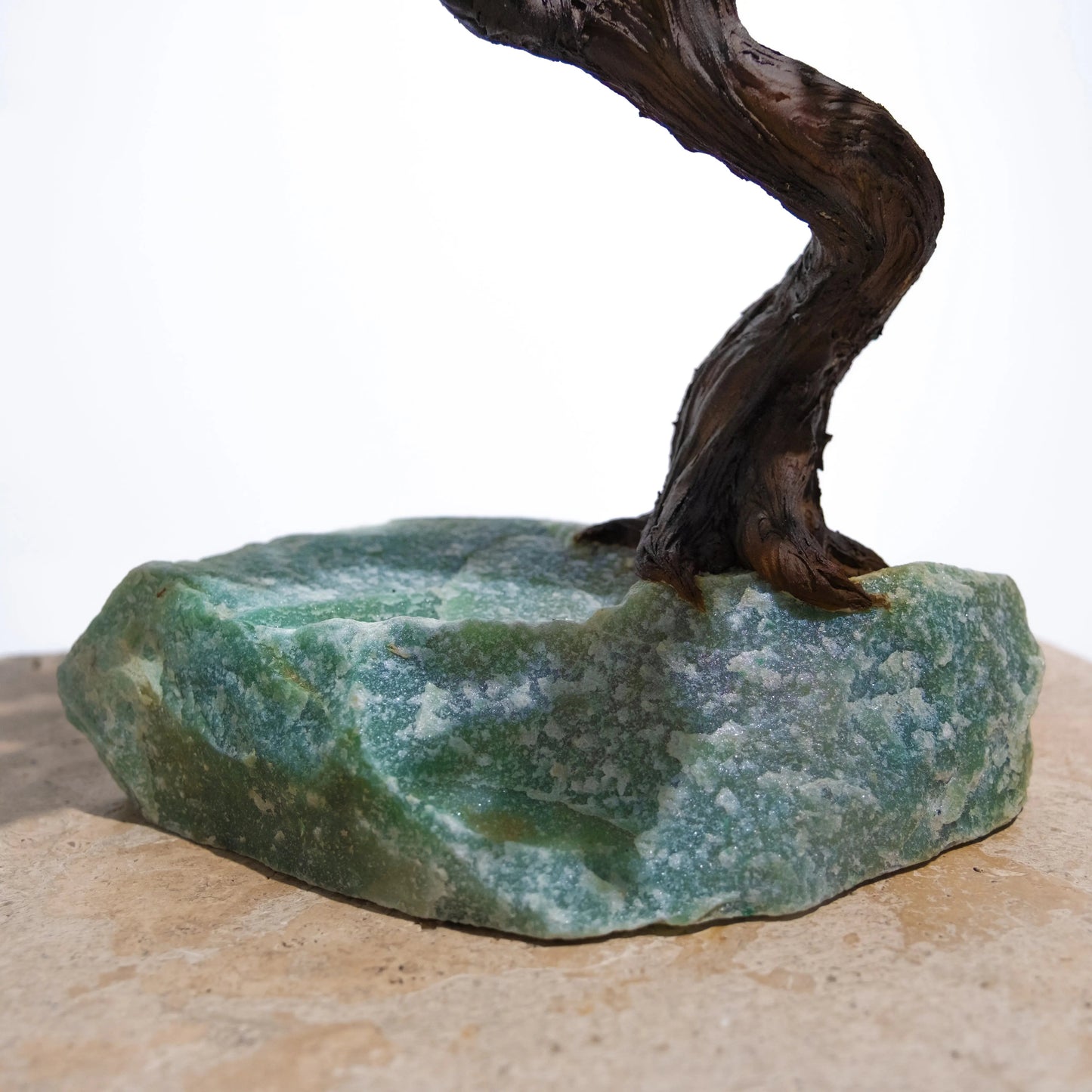 Close-up of Rough Aventurine Crystal Bonsai Tree base, symbolizing prosperity and positive energy in home decor.