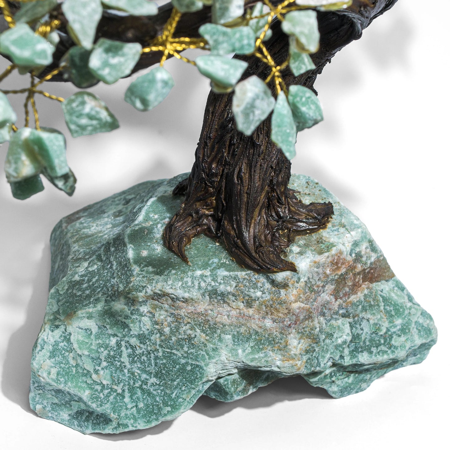 Close-up of a handcrafted rough Aventurine Crystal Bonsai Tree with green crystals symbolizing harmony and positive energy.