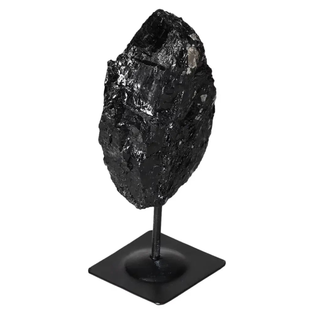 Rough Black Tourmaline on Metal Stand M from Sylvia Crystals, a premium tool for cleansing and transforming negative energy.