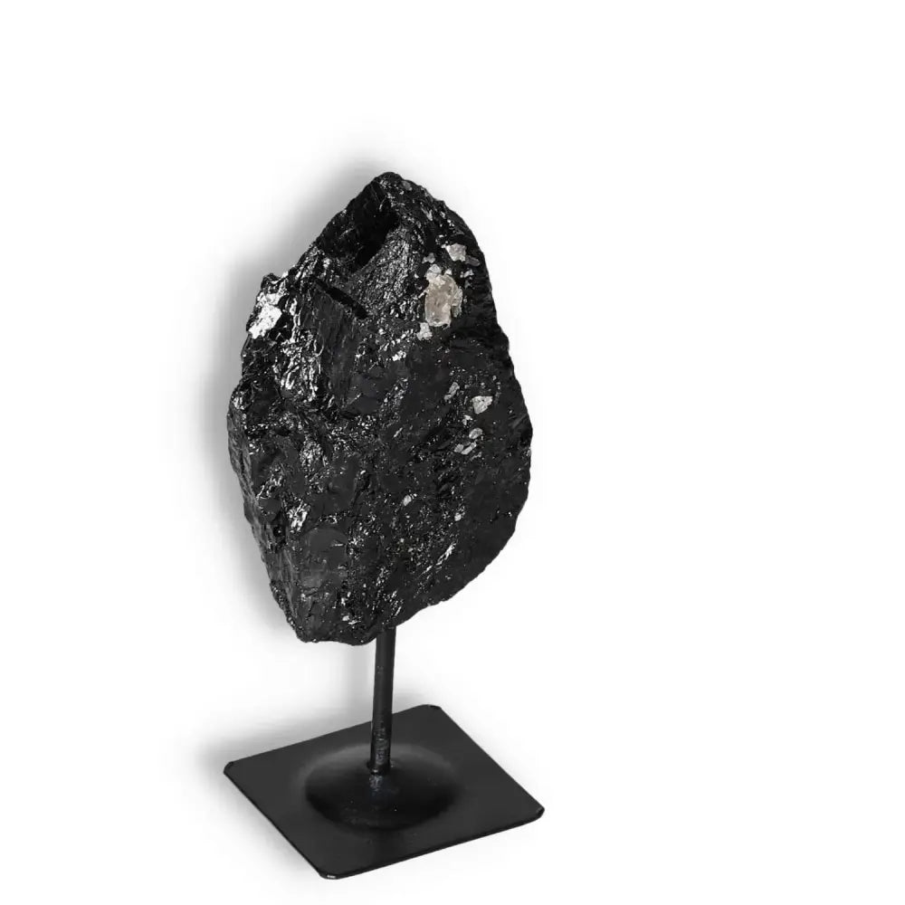 Rough Black Tourmaline with Metal Stand M, a premium crystal for cleansing and transforming energies by Sylvia Crystals.