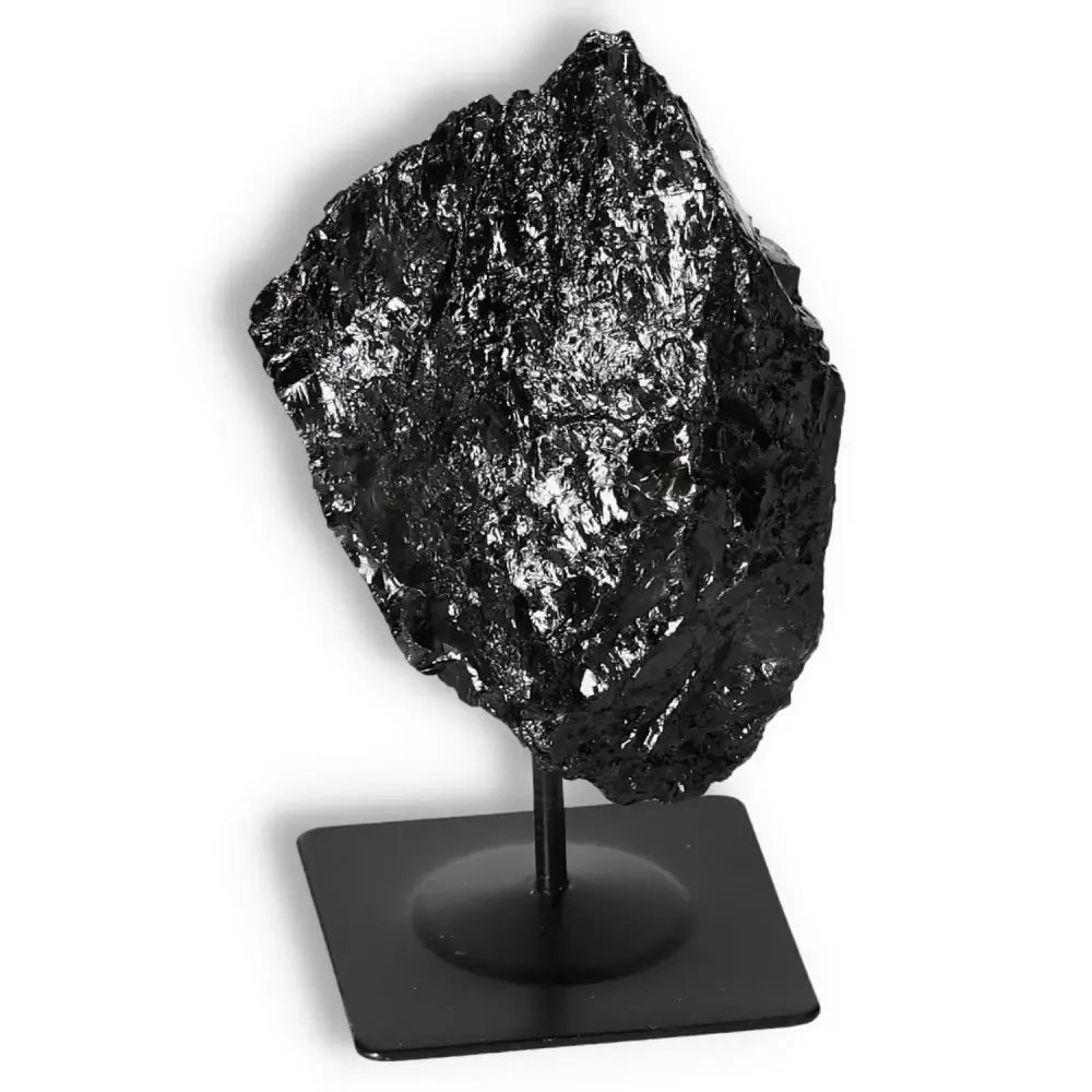 Rough Black Tourmaline on Metal Stand M, detoxifying crystal from Sylvia Crystals, perfect for energy cleansing and decoration.