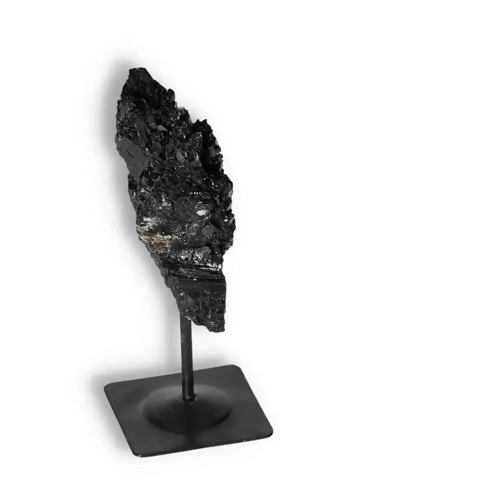 Rough Black Tourmaline with Metal Stand S by Sylvia Crystals, renowned for transforming negative energies, premium crystal decor.