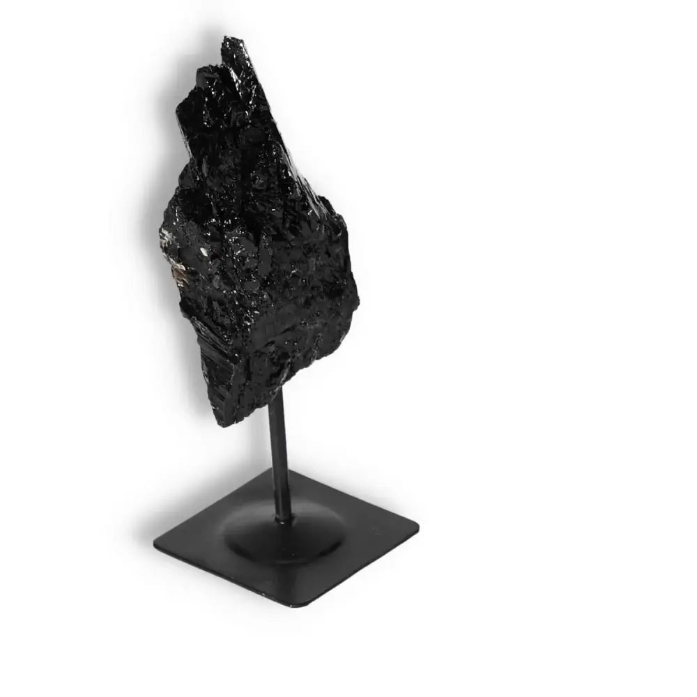 Rough black tourmaline on metal stand S, premium crystal from Sylvia Crystals, renowned for cleansing negative energies.