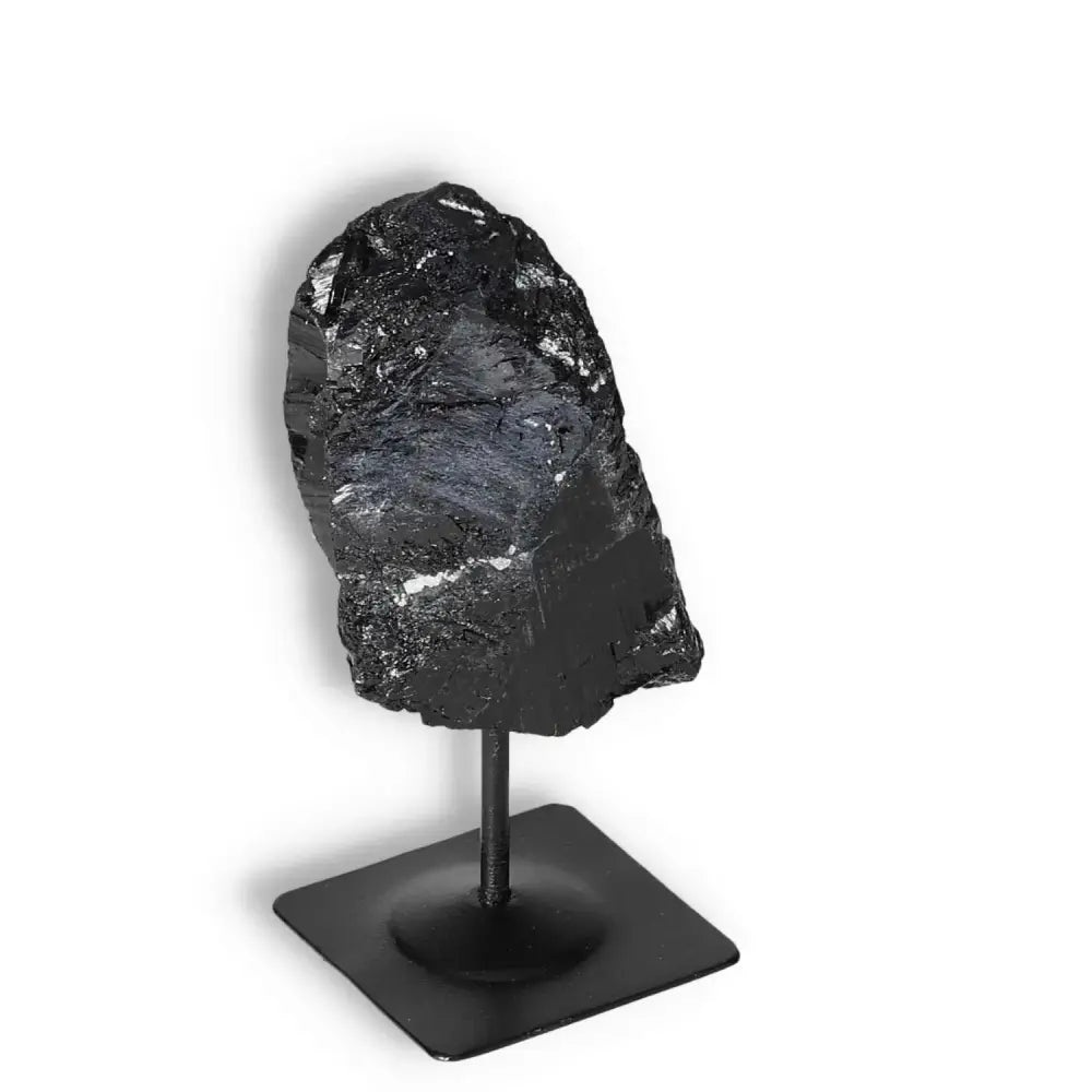 Rough Black Tourmaline on Metal Stand S by Sylvia Crystals, known for cleansing negative energies, premium handpicked quality.