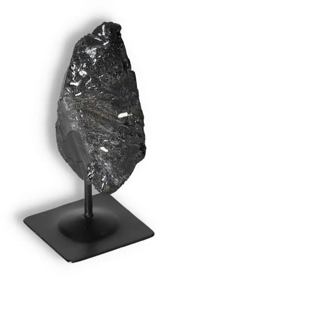 Rough Black Tourmaline with Metal Stand S by Sylvia Crystals, known for its energy-cleansing properties and premium quality.