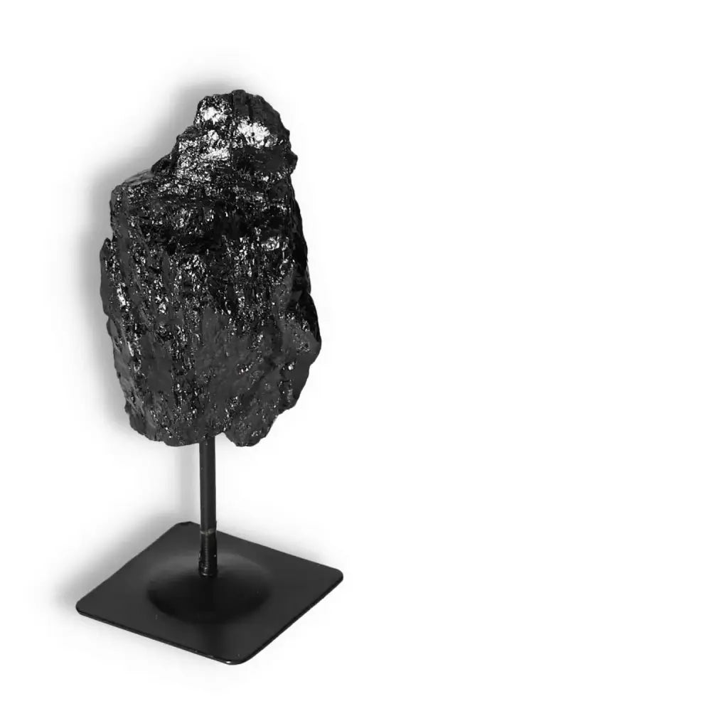 Rough Black Tourmaline on Metal Stand S by Sylvia Crystals for energy cleansing and transformation.