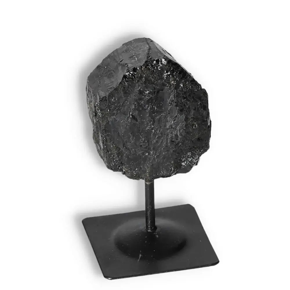 Rough Black Tourmaline with Metal Stand S from Sylvia Crystals, known for cleansing negative energy and enhancing focus.