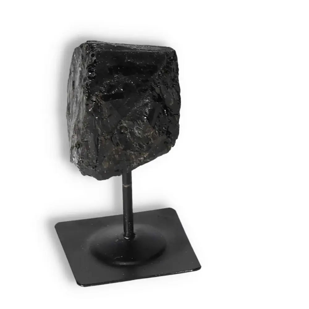 Rough Black Tourmaline on Metal Stand S by Sylvia Crystals, known for energy cleansing and grounding properties.