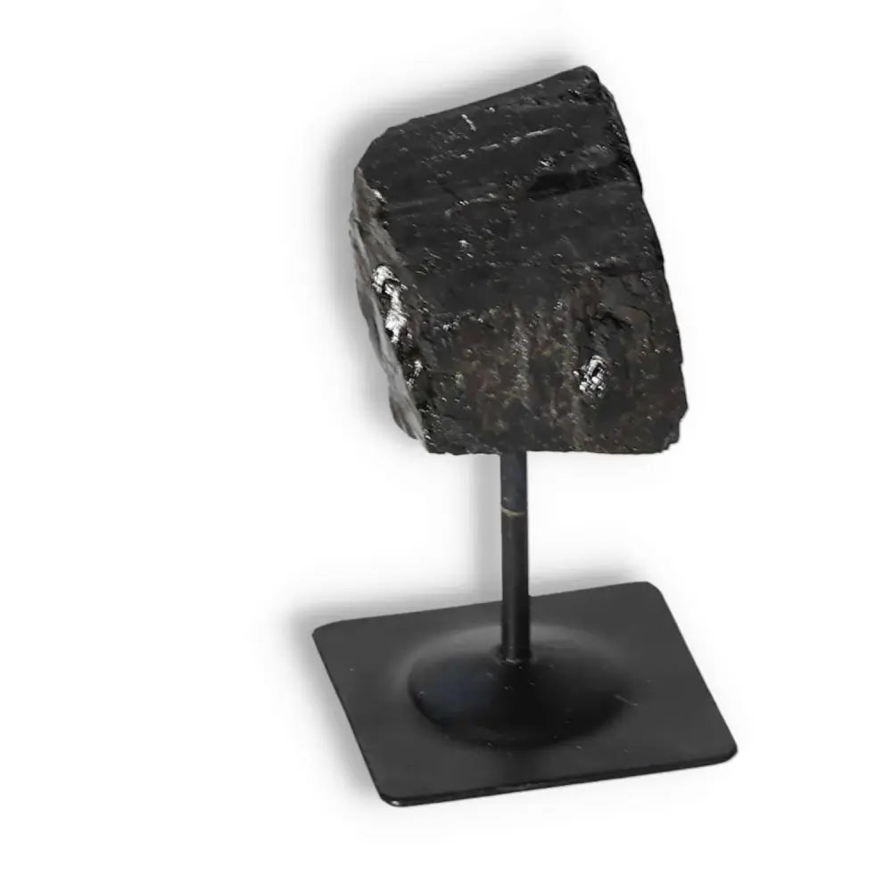 Rough Black Tourmaline with Metal Stand S by Sylvia Crystals, a premium gemstone for grounding and negative energy cleansing.