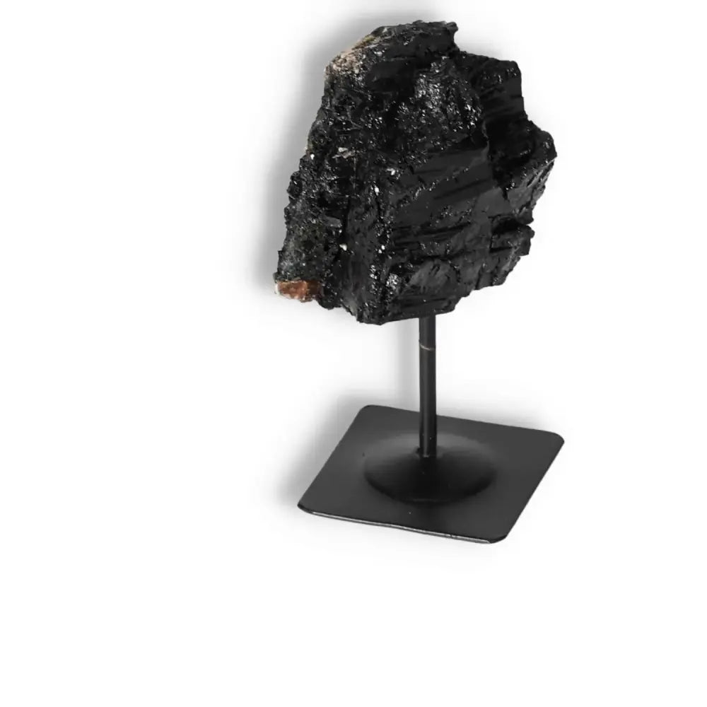 Rough Black Tourmaline with Metal Stand S by Sylvia Crystals, known for transforming negative energies and enhancing emotional balance.