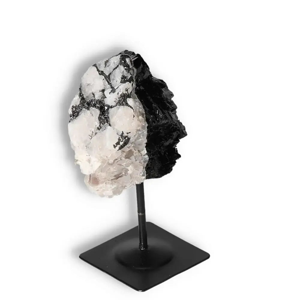 Rough Black Tourmaline on Metal Stand, premium crystal by Sylvia Crystals, shields against negative energy, aids emotional healing.