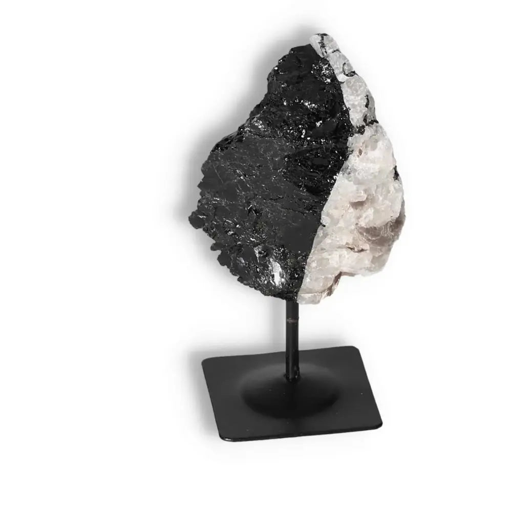 Rough Black Tourmaline with Metal Stand S, a healing crystal by Sylvia Crystals, known for its grounding and protective properties.