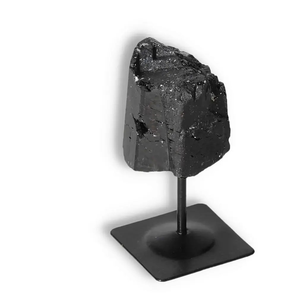 Rough Black Tourmaline on metal stand S, luxury gemstone by Sylvia Crystals, enhances spiritual harmony and mental balance.