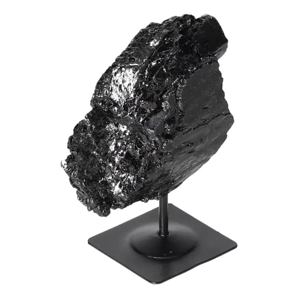 Rough Black Tourmaline on Metal Stand by Sylvia Crystals, known for powerful energy cleansing and luxurious crystal decor.