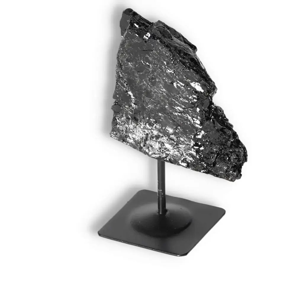 Rough Black Tourmaline on Metal Stand S by Sylvia Crystals, a premium crystal known for cleansing and transforming energies.