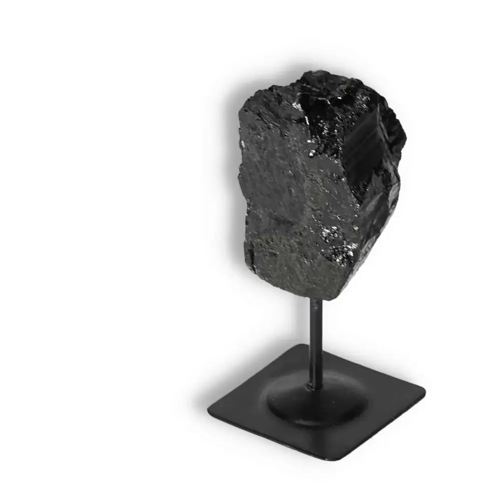Rough Black Tourmaline with Metal Stand S for energy cleansing and protection by Sylvia Crystals.