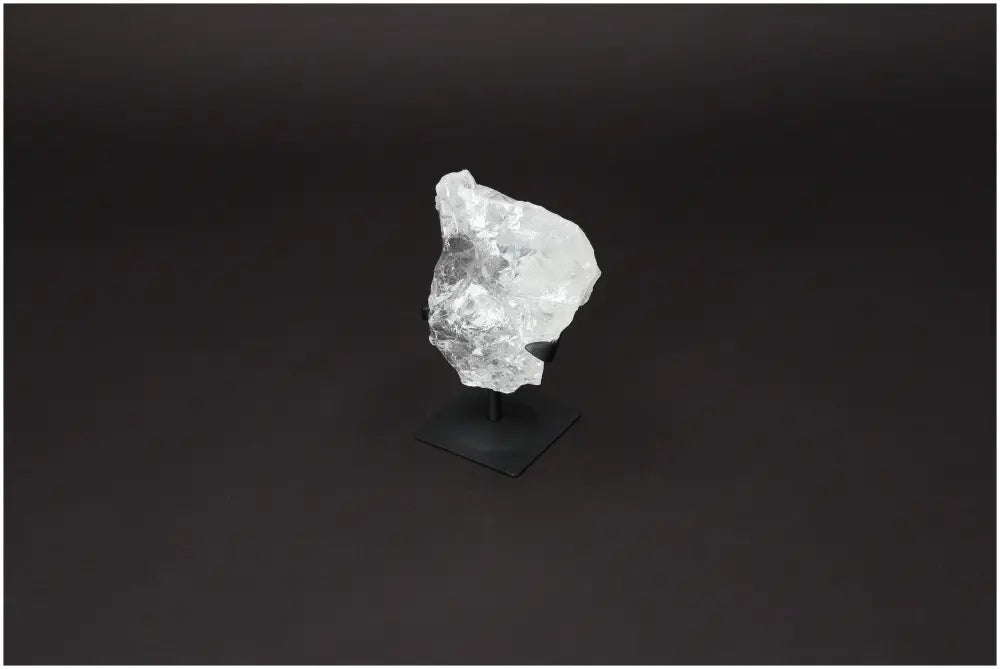 Rough Lemurian Quartz on metal stand; premium crystal by Sylvia Crystals, perfect for home decoration and spiritual harmonization.