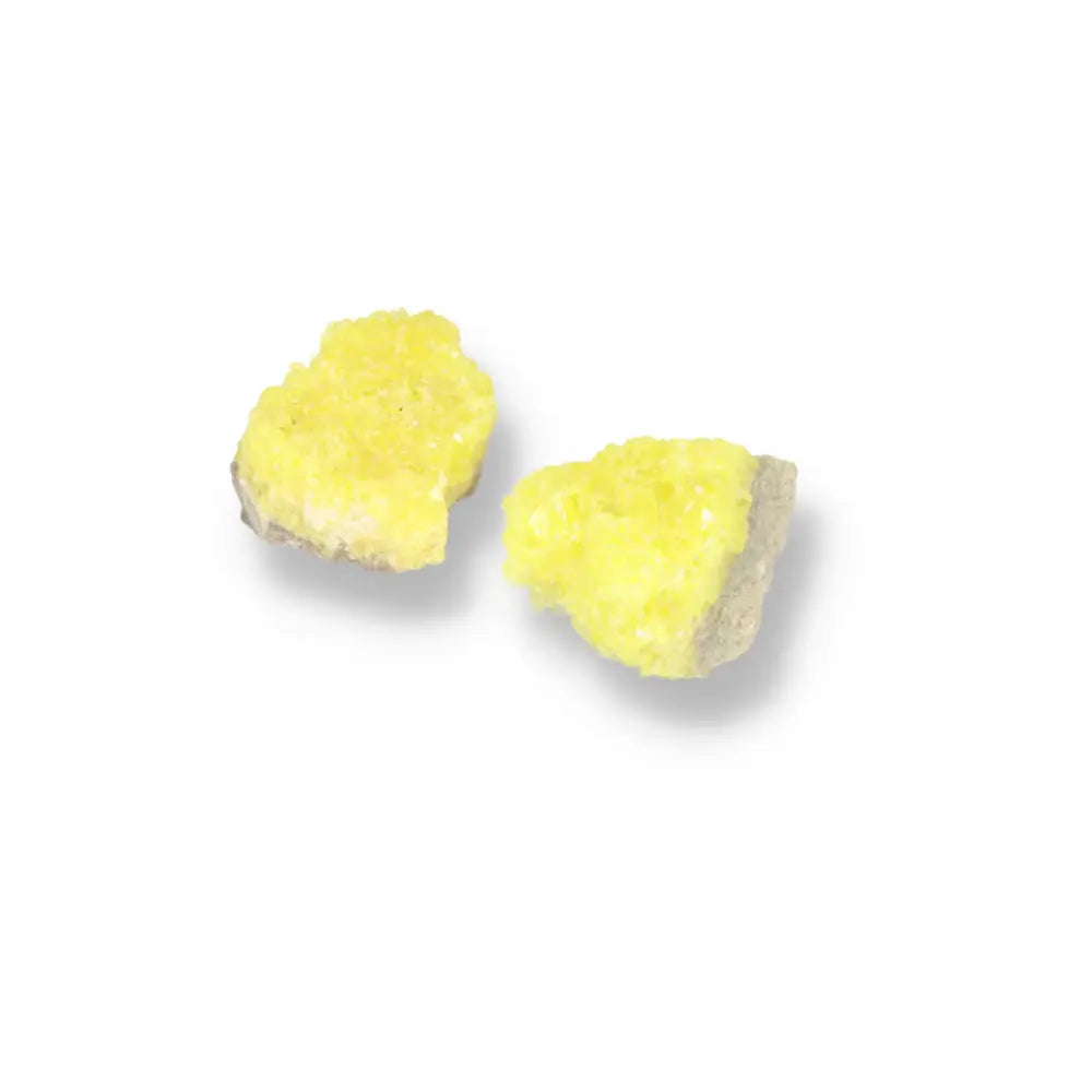 Two vibrant yellow Rough Sulphur Druze L crystals exemplifying luxury and transformative energy from Sylvia Crystals.