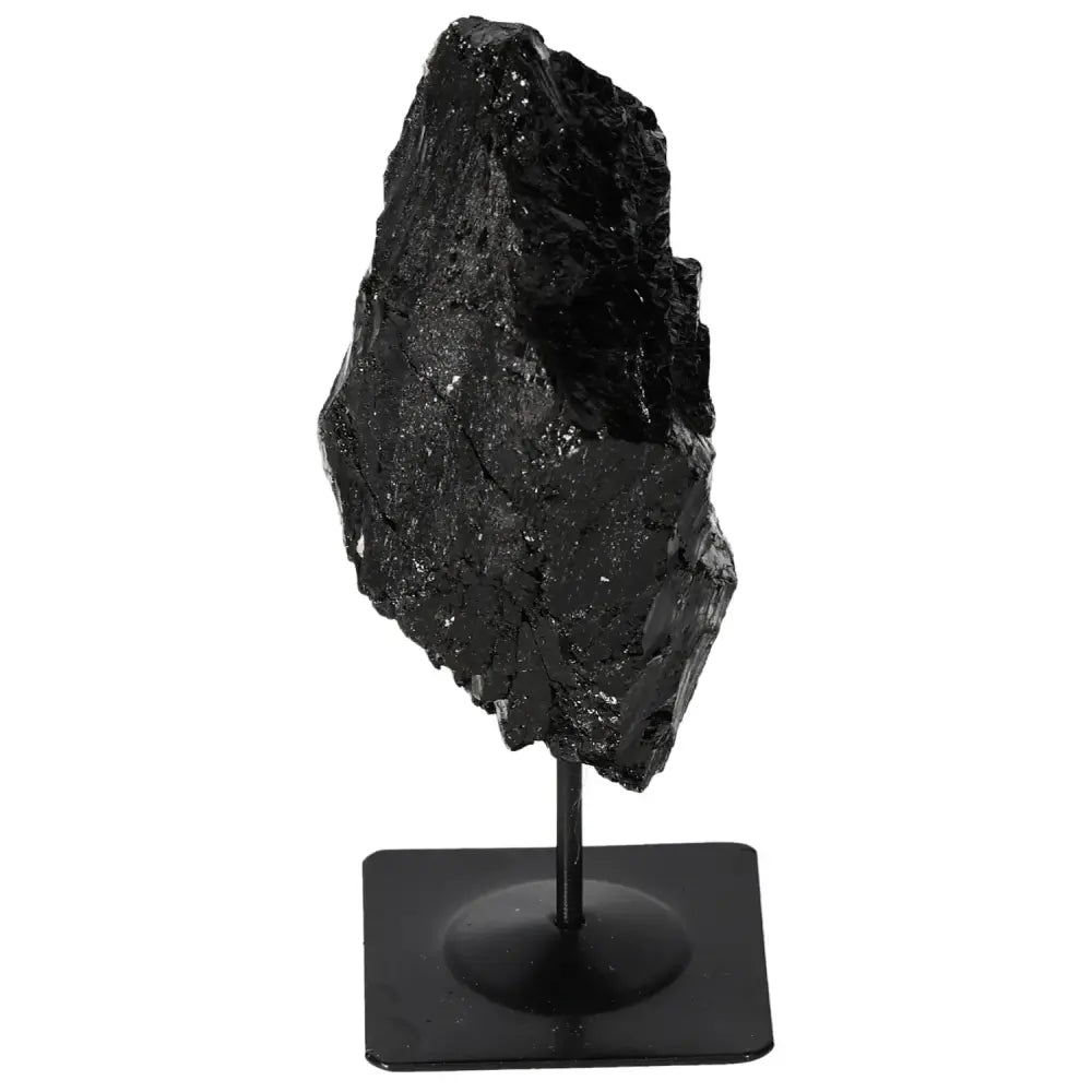 Rough tourmaline on metal stand, premium Sylvia Crystals design offering mystical benefits and visual charm, perfect for interiors.