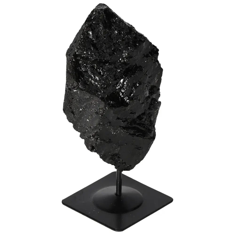 Rough Tourmaline Crystal on Metal Stand by Sylvia Crystals, featuring a unique design for home decor and mystical benefits.