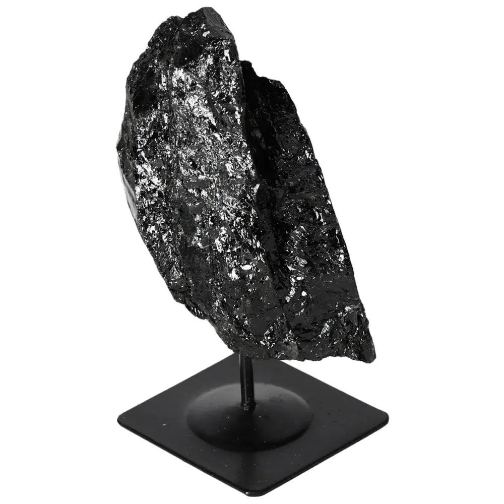 Rough Black Tourmaline on Metal Stand by Sylvia Crystals, showcasing natural energy-balancing properties, premium quality.