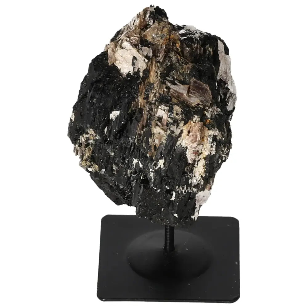 Rough tourmaline crystal on sleek metal stand, showcasing natural elegance and captivating colors, ideal for home decor by Sylvia Crystals.