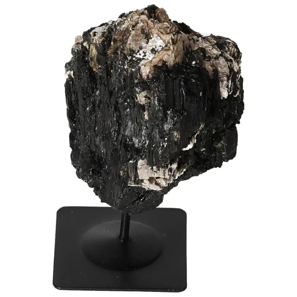 Rough tourmaline crystal on a metal stand, showcasing its raw and natural elegance, ideal as a sophisticated interior centerpiece.