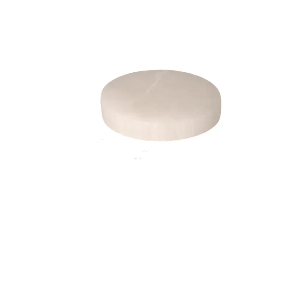 Hexagonal 8cm selenite disk by Sylvia Crystals, designed for spiritual growth and mindful living.