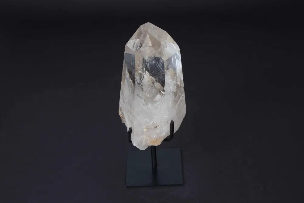 Semi Polished Clear Quartz Point on Stand, ideal for energy amplification, meditation, and space refinement with natural clarity.
