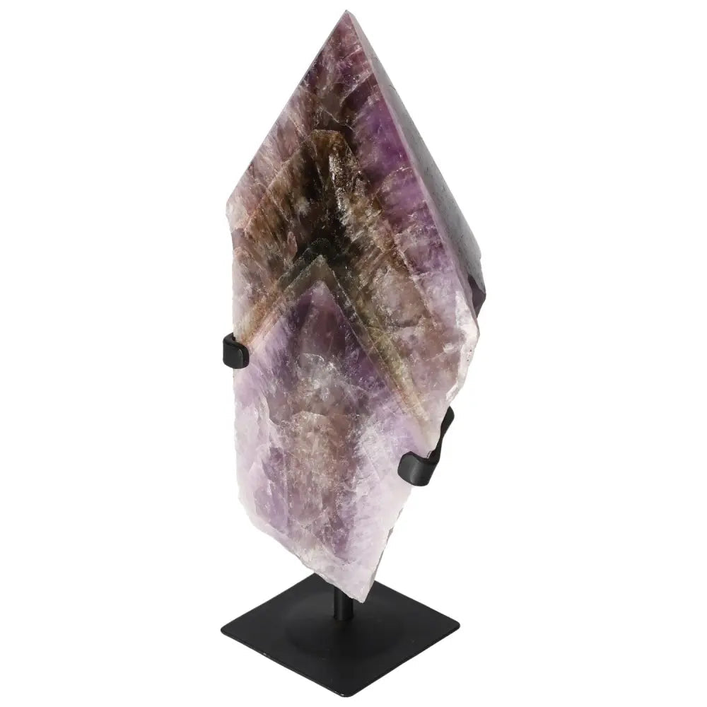 Seven Point Polished Amethyst by Sylvia Crystals on stand, ideal for decor or stress relief.