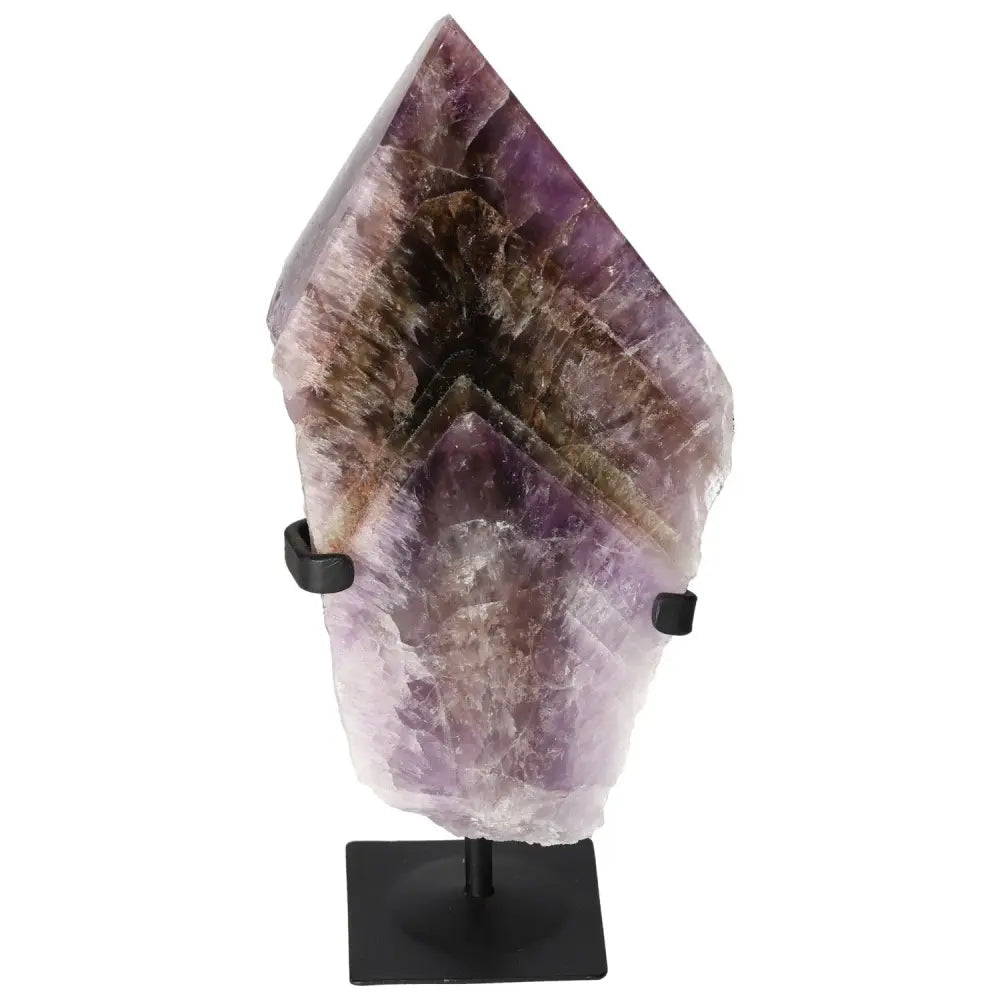 Seven Point Polished Amethyst crystal from Sylvia Crystals on stand, showcasing its vibrant purple hues, used for decor and tranquility.