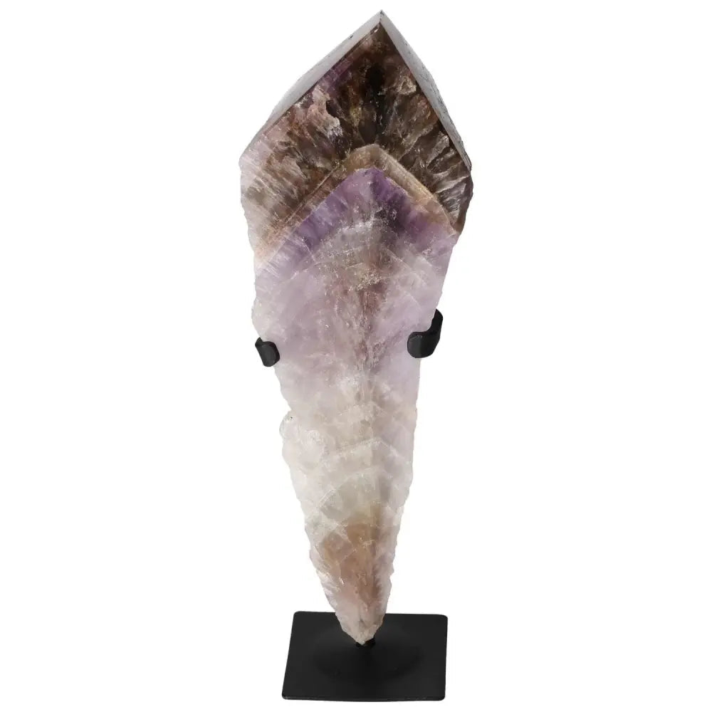 Seven Point Polished Amethyst gemstone by Sylvia Crystals, enhancing beauty and promoting emotional stability, on a black stand.