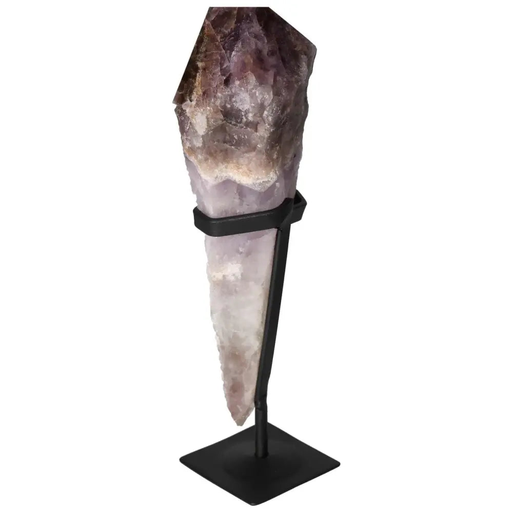 Seven Point Polished Amethyst from Sylvia Crystals in a stand, showcasing its premium quality and stress-reducing properties.