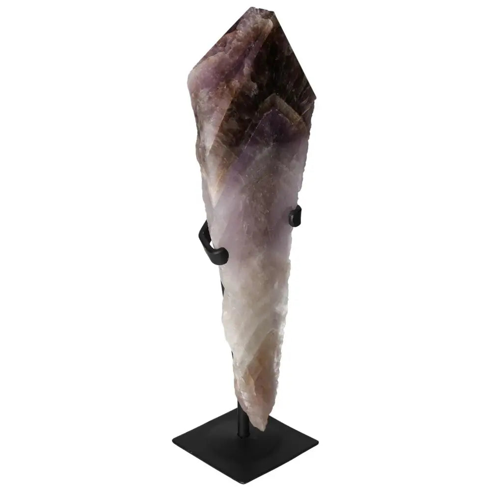 Seven Point Polished Amethyst on display stand from Sylvia Crystals, known for reducing stress and enhancing concentration.