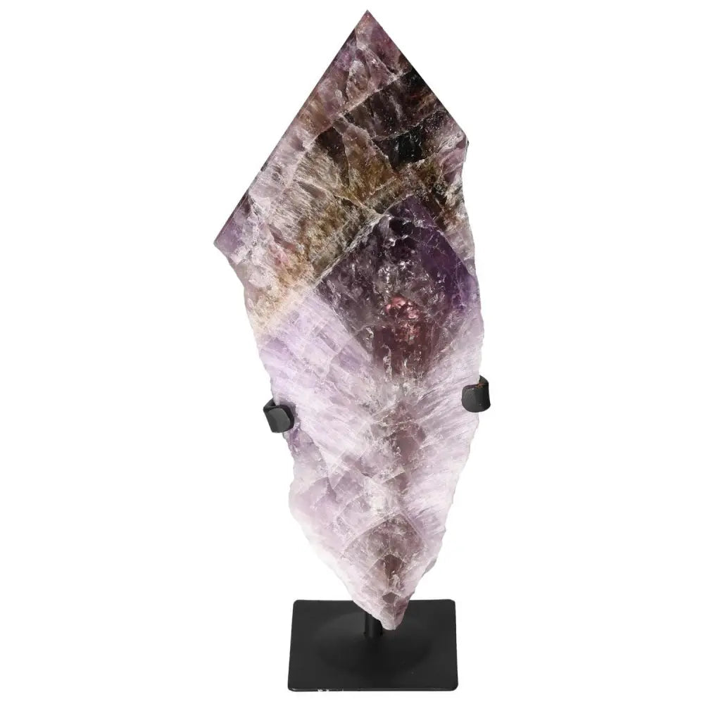 Seven Point Polished Amethyst crystal on display stand, symbolizing spiritual rejuvenation and stress relief, from Sylvia Crystals.
