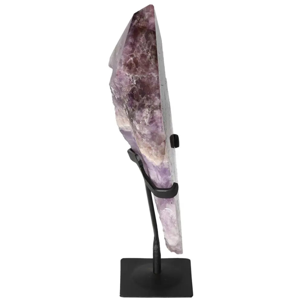Side view of Seven Point Polished Amethyst by Sylvia Crystals, showcasing its exquisite craftsmanship and spiritual healing properties.