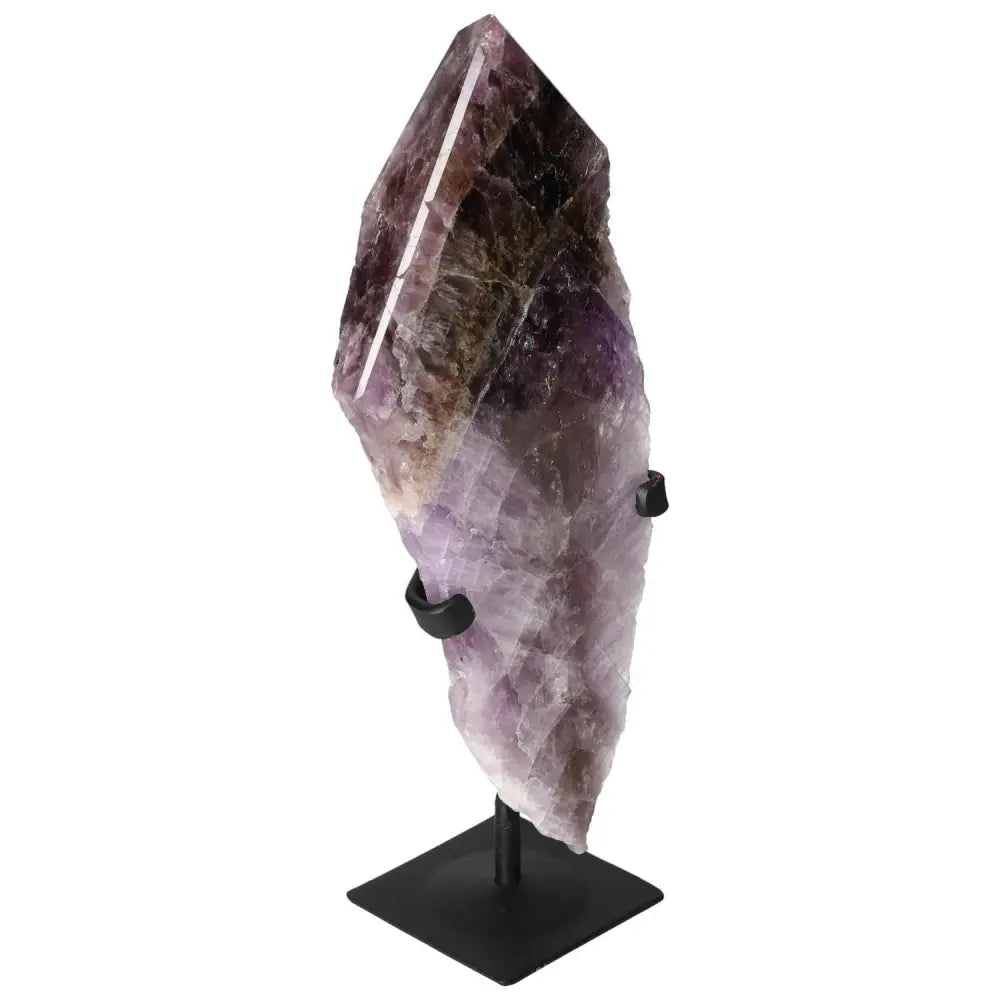 Seven Point Polished Amethyst crystal on a stand from Sylvia Crystals, showcasing its deep purple hues and natural beauty.