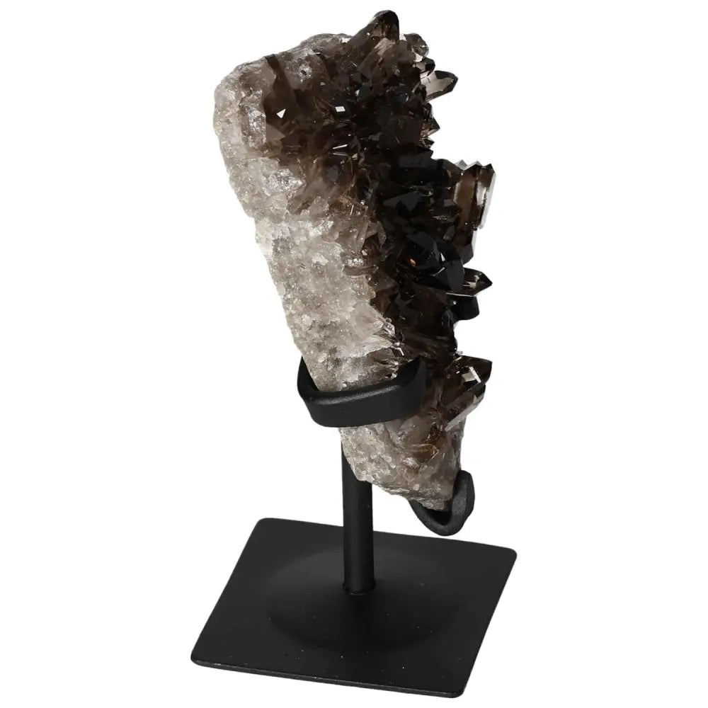 Elegant Smoky Quartz crystal on metal stand from Sylvia Crystals, enhancing decor and mental clarity with a sophisticated touch.
