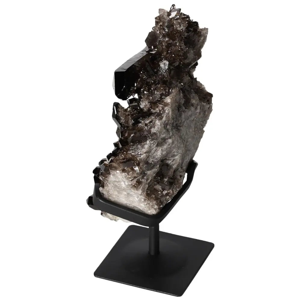 Smoky Quartz crystal on sleek metal stand, enhancing clarity and balance, from Sylvia Crystals, ideal for professionals.