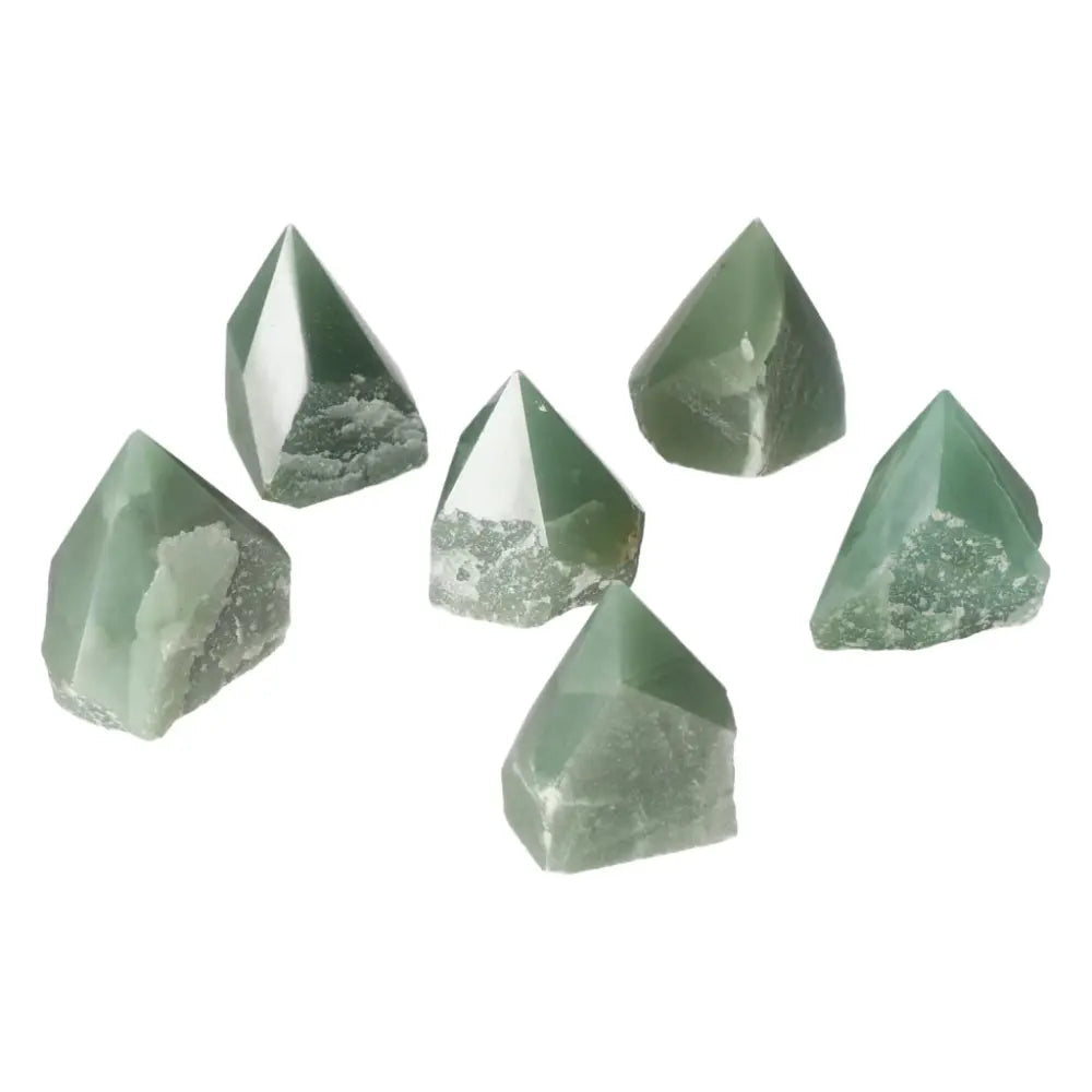 Top Polished Point Green Quartz XS crystals from Sylvia Crystals, showcasing captivating beauty and elegance, ideal for conscious living.