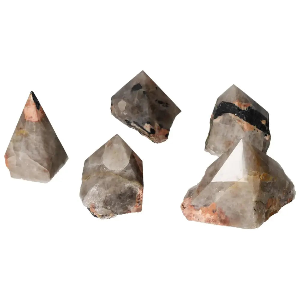 Collection of Top Polished Point Quartz with Tourmaline inclusions, showcasing refined elegance and spiritual depth from Sylvia Crystals.