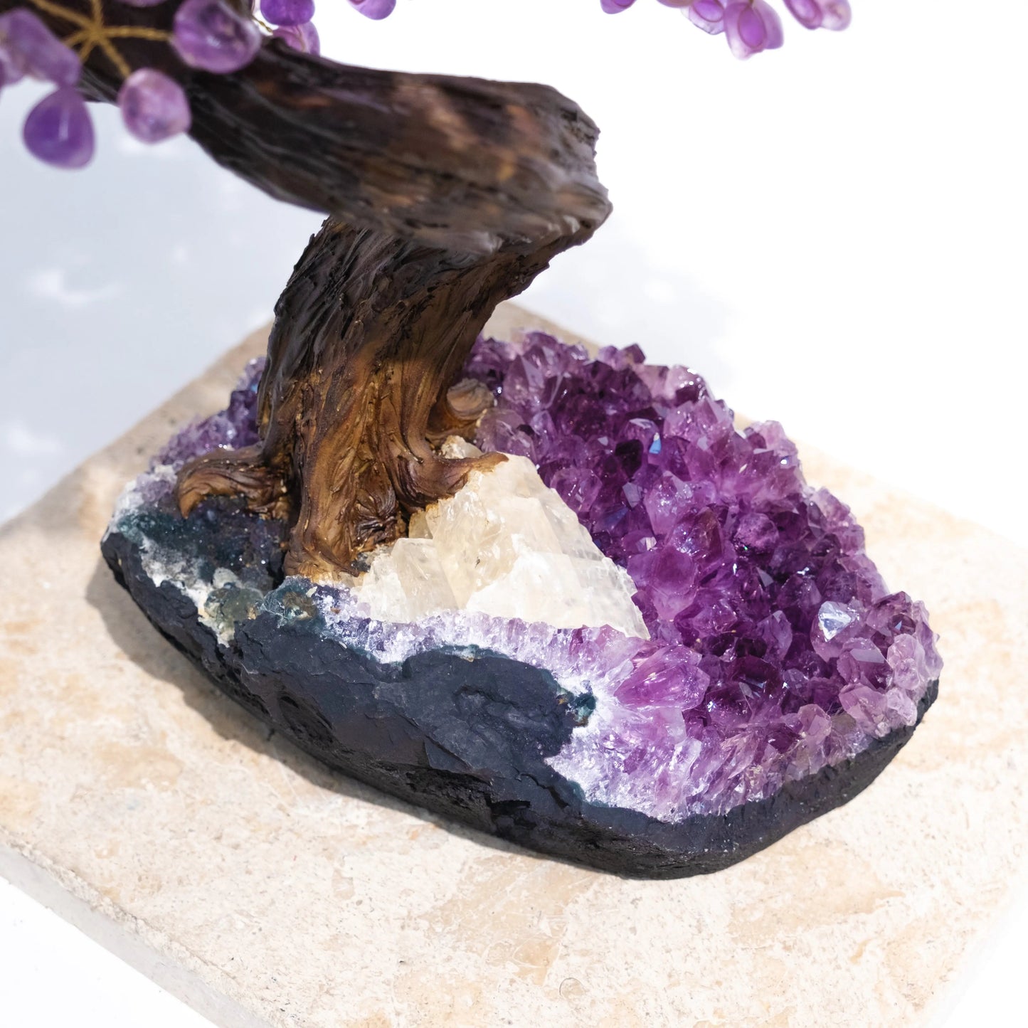 Tumbled Amethyst Crystal Bonsai Tree with gemstone leaves, radiating calming and protective energies for spiritual harmony.