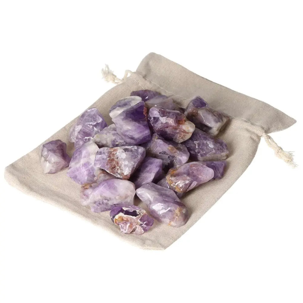 Tumbled Chevron Amethyst stones in pouch, luxury and spiritual collection by Sylvia Crystals, 1KG 20PCS, symbolizing clarity.