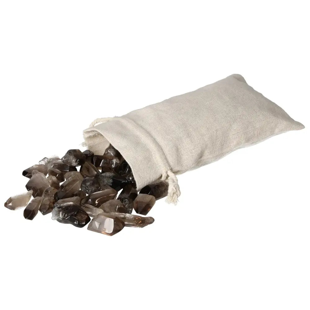Bag of tumbled smoky quartz points from Sylvia Crystals, enhancing practical thinking and grounding energy for collectors.