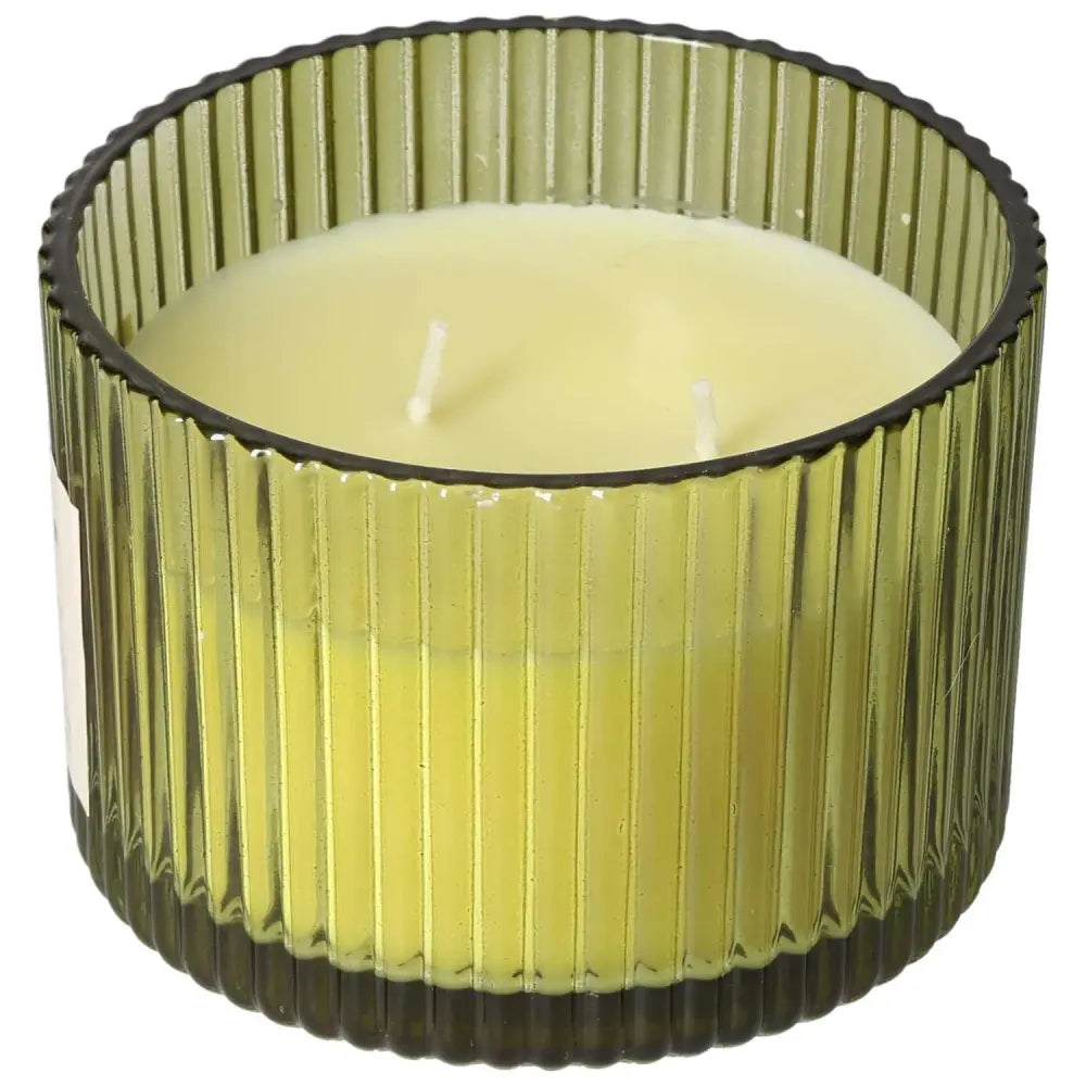 Green glass container holding the luxurious Tuscan Fig Scented Candle, featuring dual wicks for even aroma distribution by Sylvia Crystals.