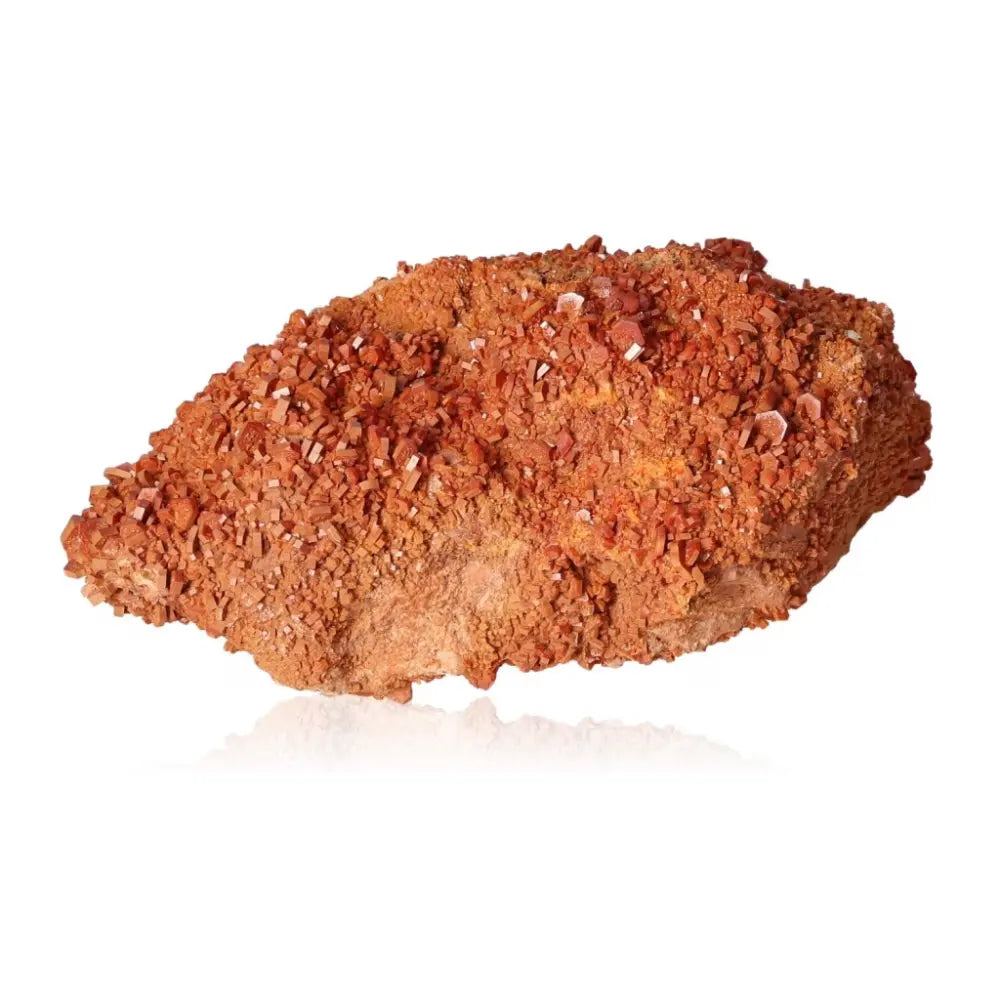 Vibrant Vanadinite druze with fiery red-orange hues, ideal for collectors seeking focus and creative energy.